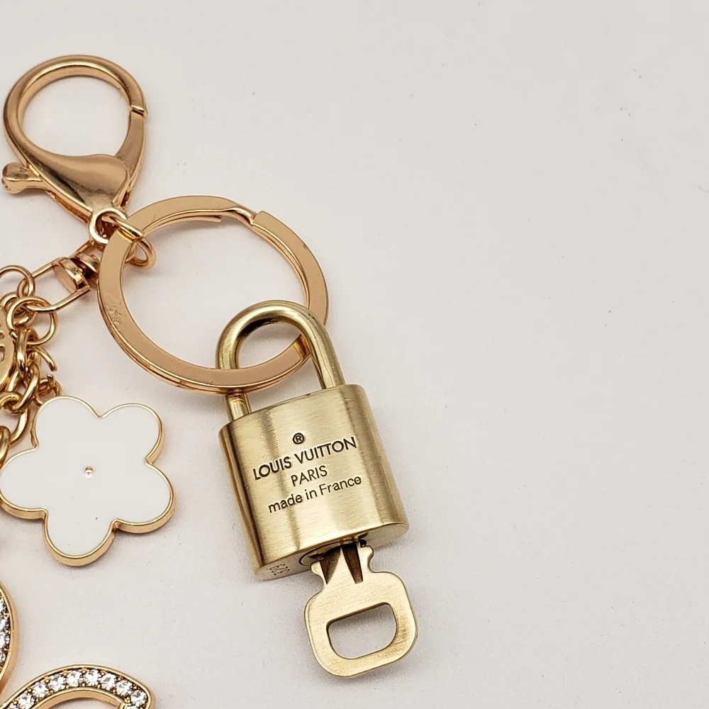 Authentic Louis Vuitton Gold Lock & Key 🔑 Bag Charm w/ Unbranded Clover Charm